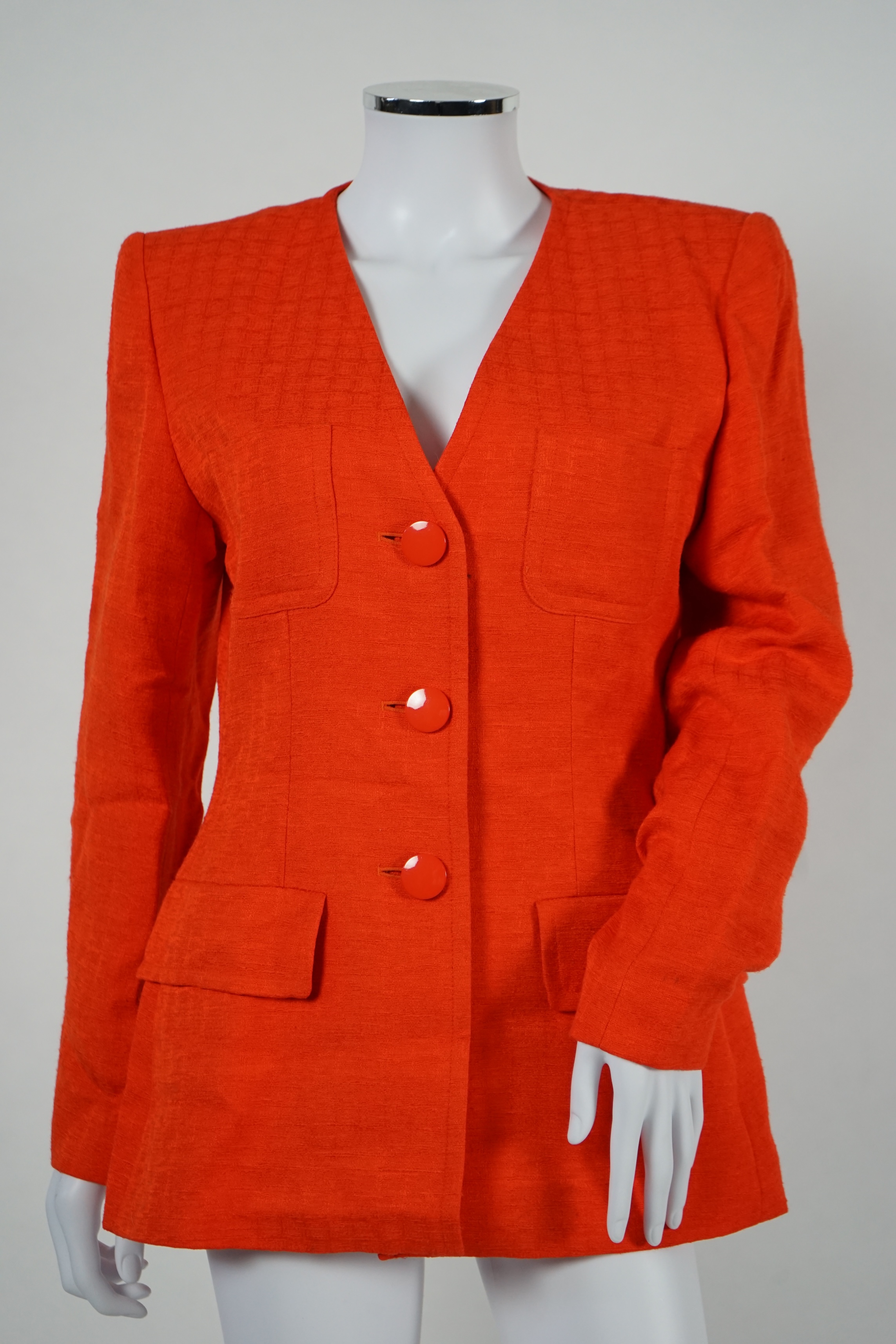 Two vintage Yves Saint Laurent variation lady's skirt suits, royal blue and orange. F 40 (UK 12).Please note alterations to make the waist smaller may have been carried out on some of the skirts. Proceeds to Happy Paws P